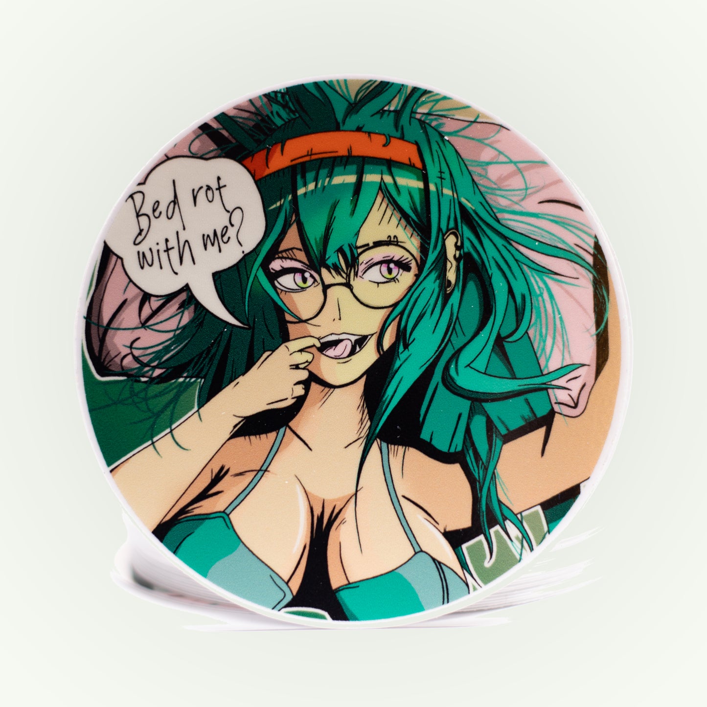 Circular product with anime-style character and text bubble saying "bed rot with me?" on a white background.