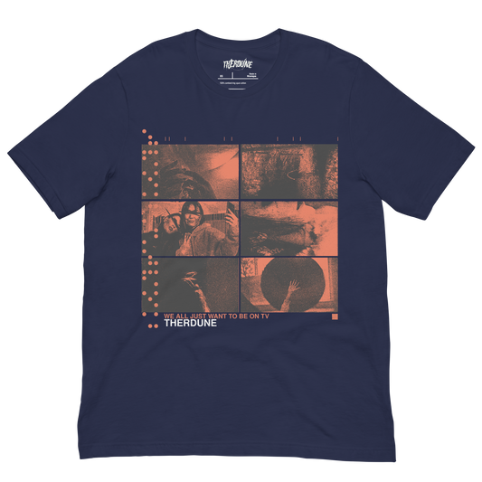 Navy shirt with red six panel distorted photos, text that says "We all want to be on tv, Therdune" flat lay on transparent background.