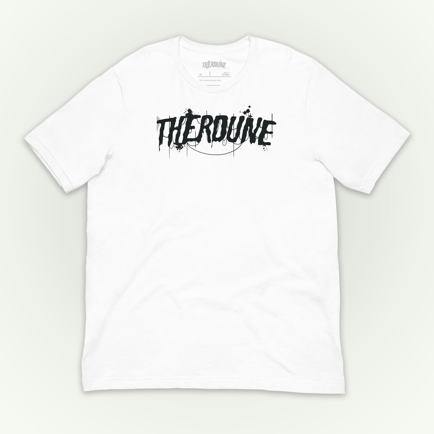 White shirt with "Therdune" logo flat lay on white background.