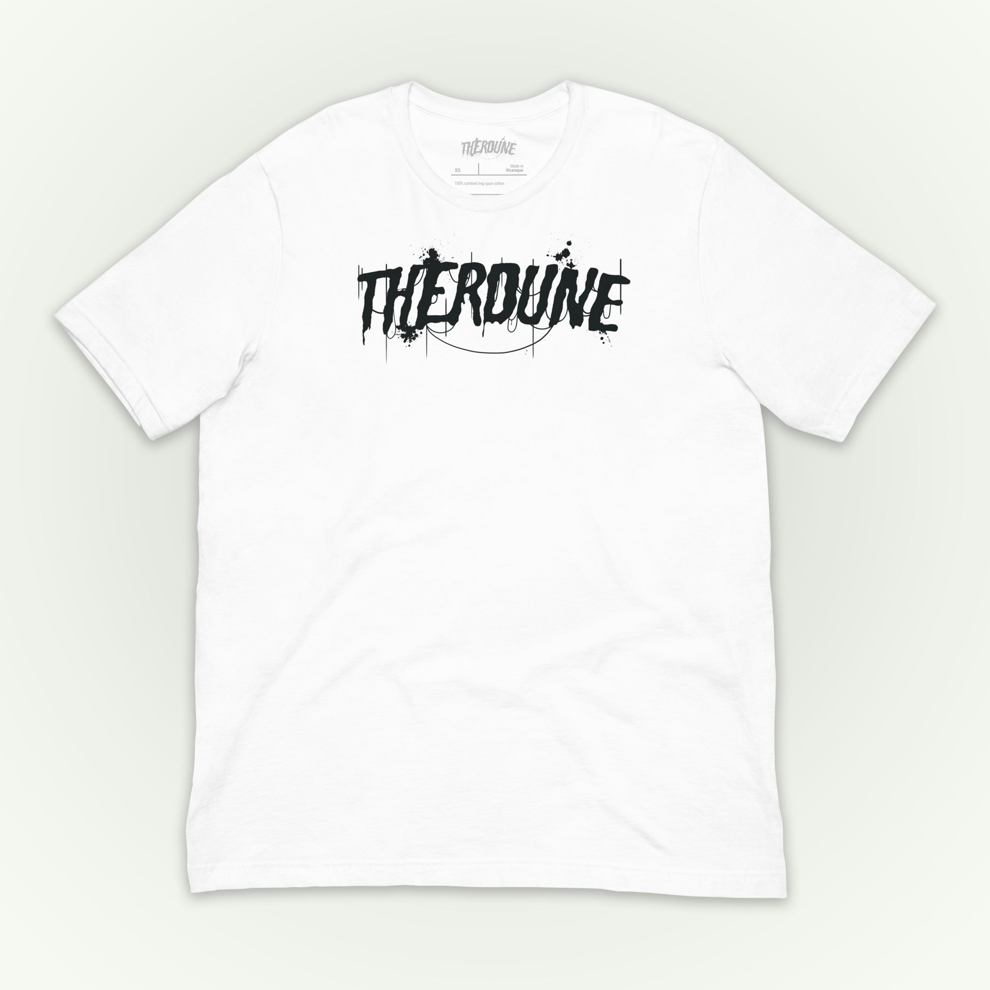White shirt with "Therdune" logo flat lay on white background.