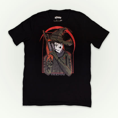 Black shirt with a graphic of a witch clown holding a tarrot card. flat lay on white background.