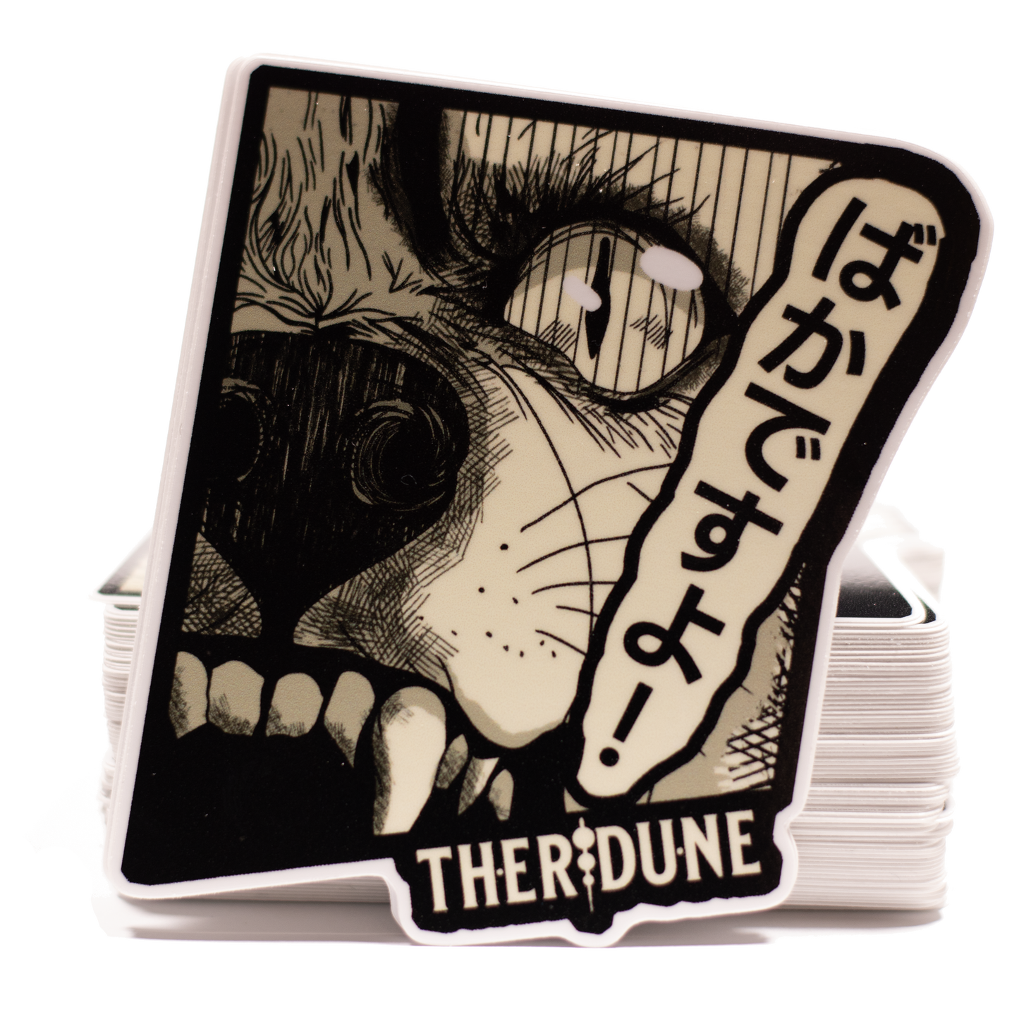 black and white manga style wolf, japanese characters that say "bakadesuyo" and an english Therdune logo.