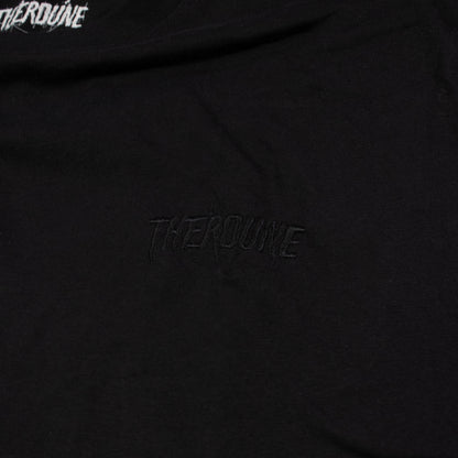 Close-up of a black T-shirt with tonal black embroidered 'Therdune' text on the chest.