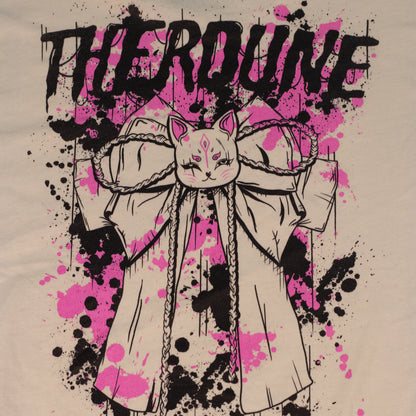 Back of cream color shirt with a graphic of a bow with pink and black paint splatter and a Therdune logo. 
