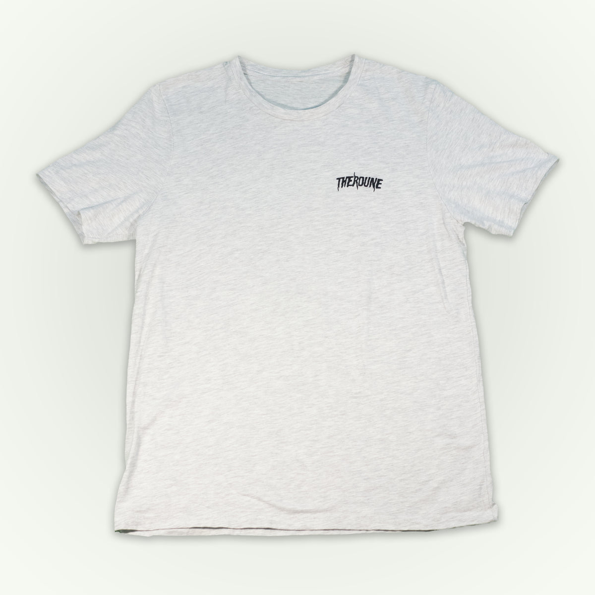 An ash short-sleeve crewneck t-shirt laid flat against a light off-white background. A black Therdune logo is printed on the left chest.