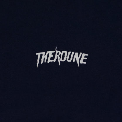 Close-up of a navy short-sleeve crewneck t-shirt laid flat. A white Therdune logo is printed on fabric.
