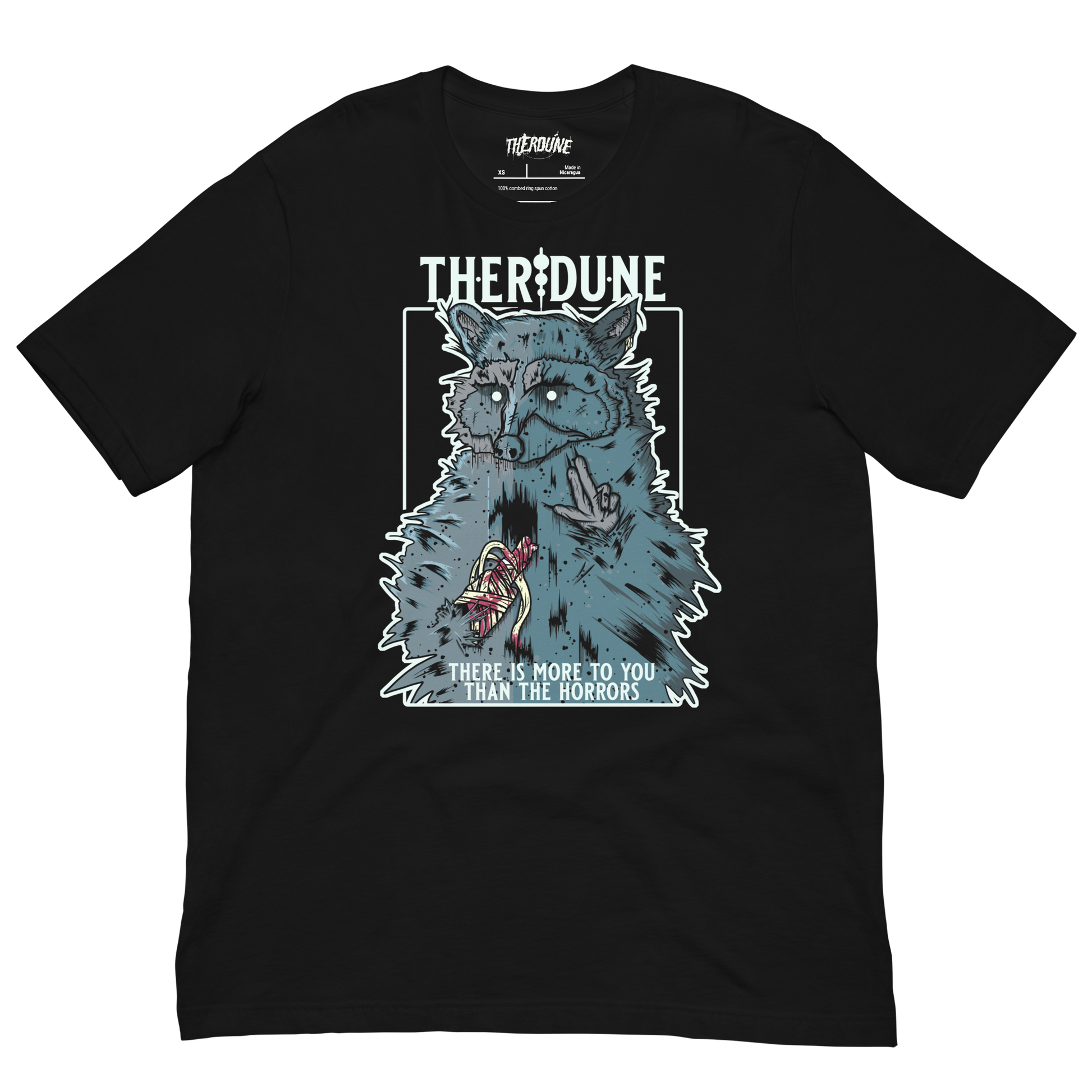 Black shirt with a graphic of a raccoon with an injured, bandaged arm. Text that says "There is more to you than the horrors" flat lay on transparent background.