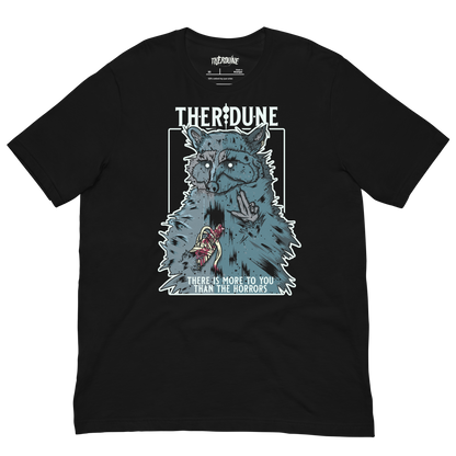 Black shirt with a graphic of a raccoon with an injured, bandaged arm. Text that says "There is more to you than the horrors" flat lay on transparent background.