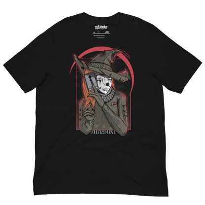Black shirt with a graphic of a witch clown holding a tarrot card. flat lay on transparent background.