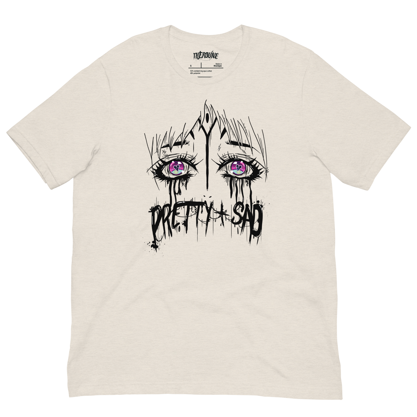 Cream color shirt with a graphic print of stylized eyes and the text 'Pretty & Sad' on the front. flat lay on transparent background.