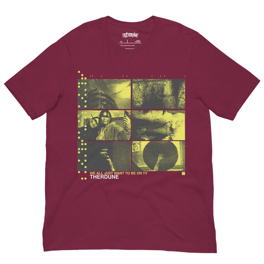Maroon shirt with yellow six panel distorted photos, text that says "We all want to be on tv, Therdune" flat lay on transparent background.
